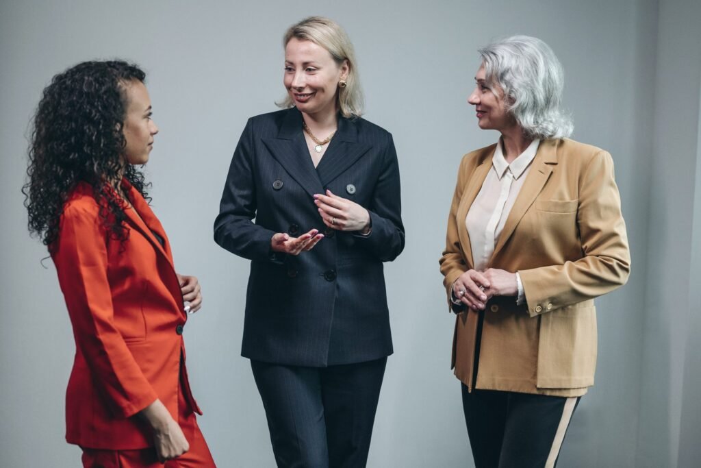 Women leaders talking after a session
