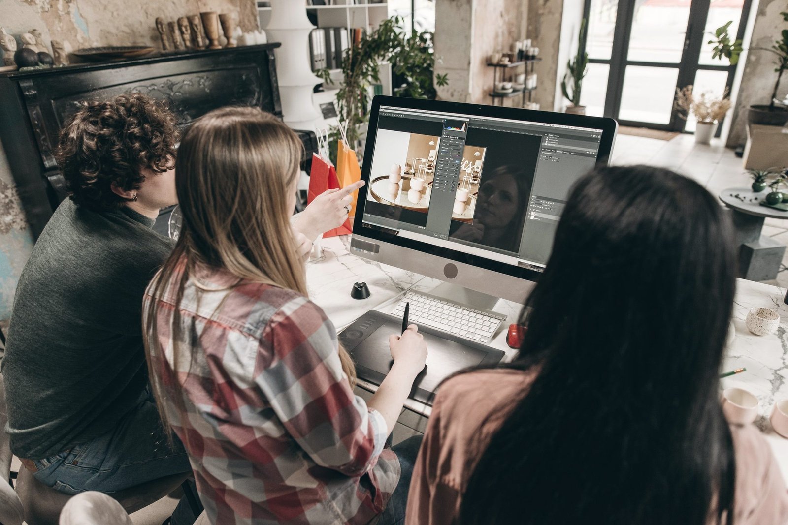 Team reviewing visual content on screen